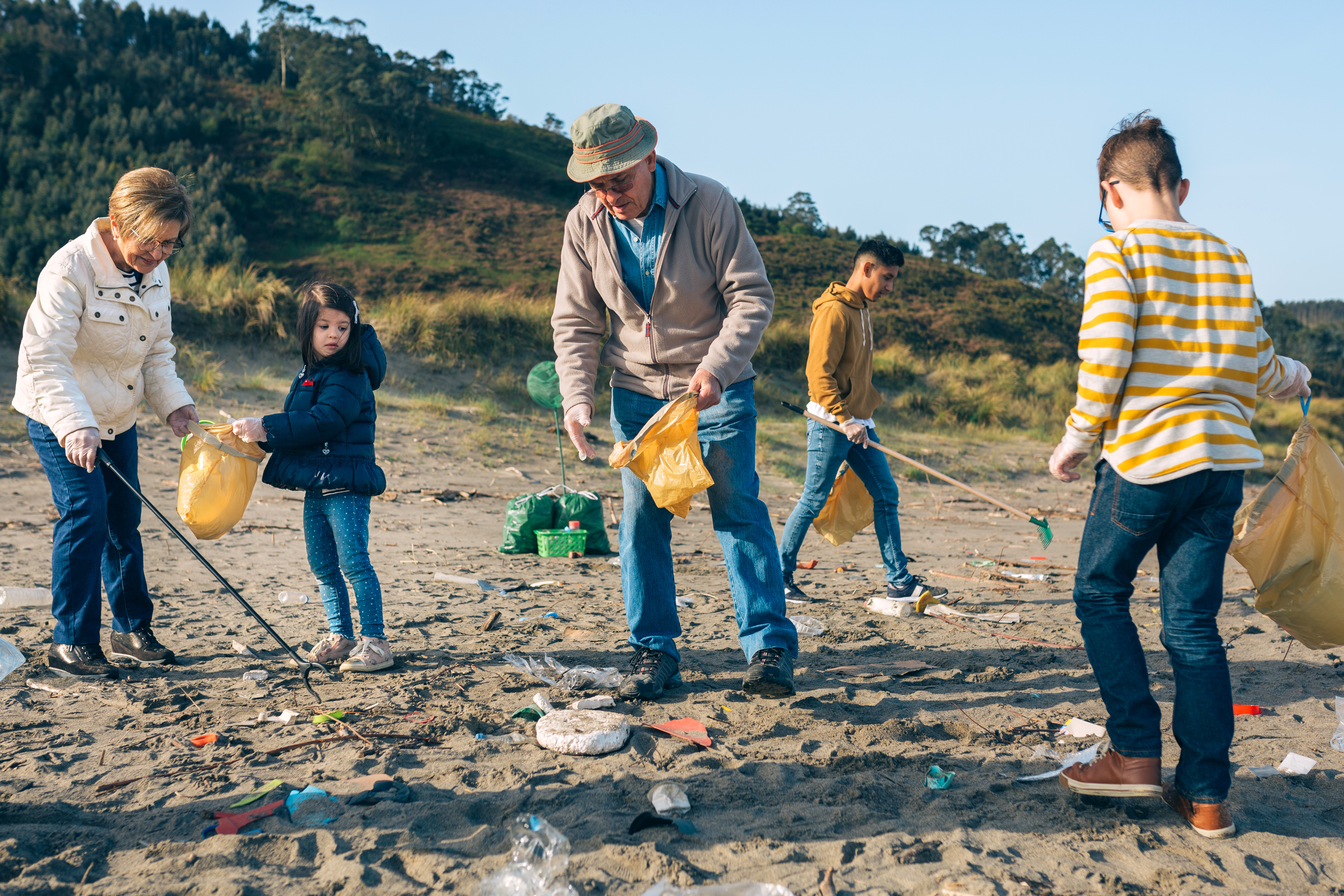 A family day out doing a beach clean